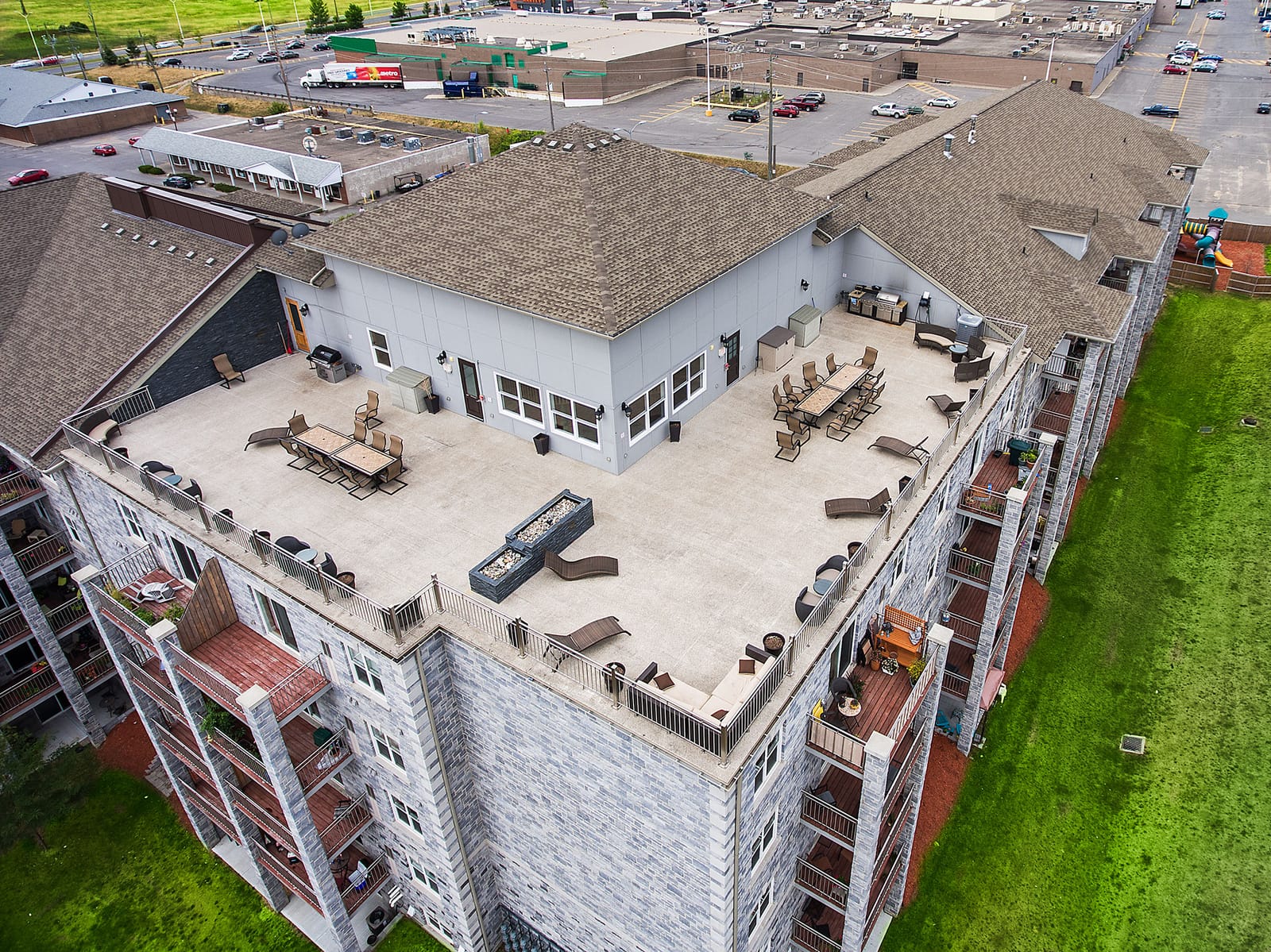 Aerial view over the roof, showing the rooftop terrace and its seating areas