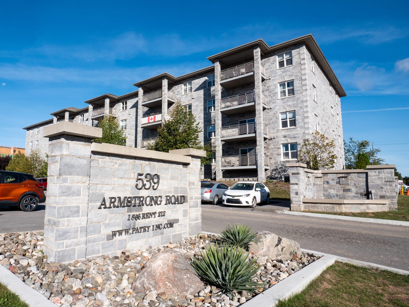 Stone entrance sign for 539 Armstrong Road