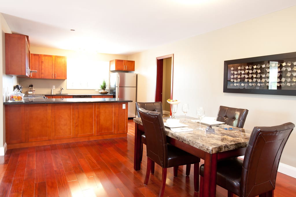 Furnished suite with the kitchen open to the dining area