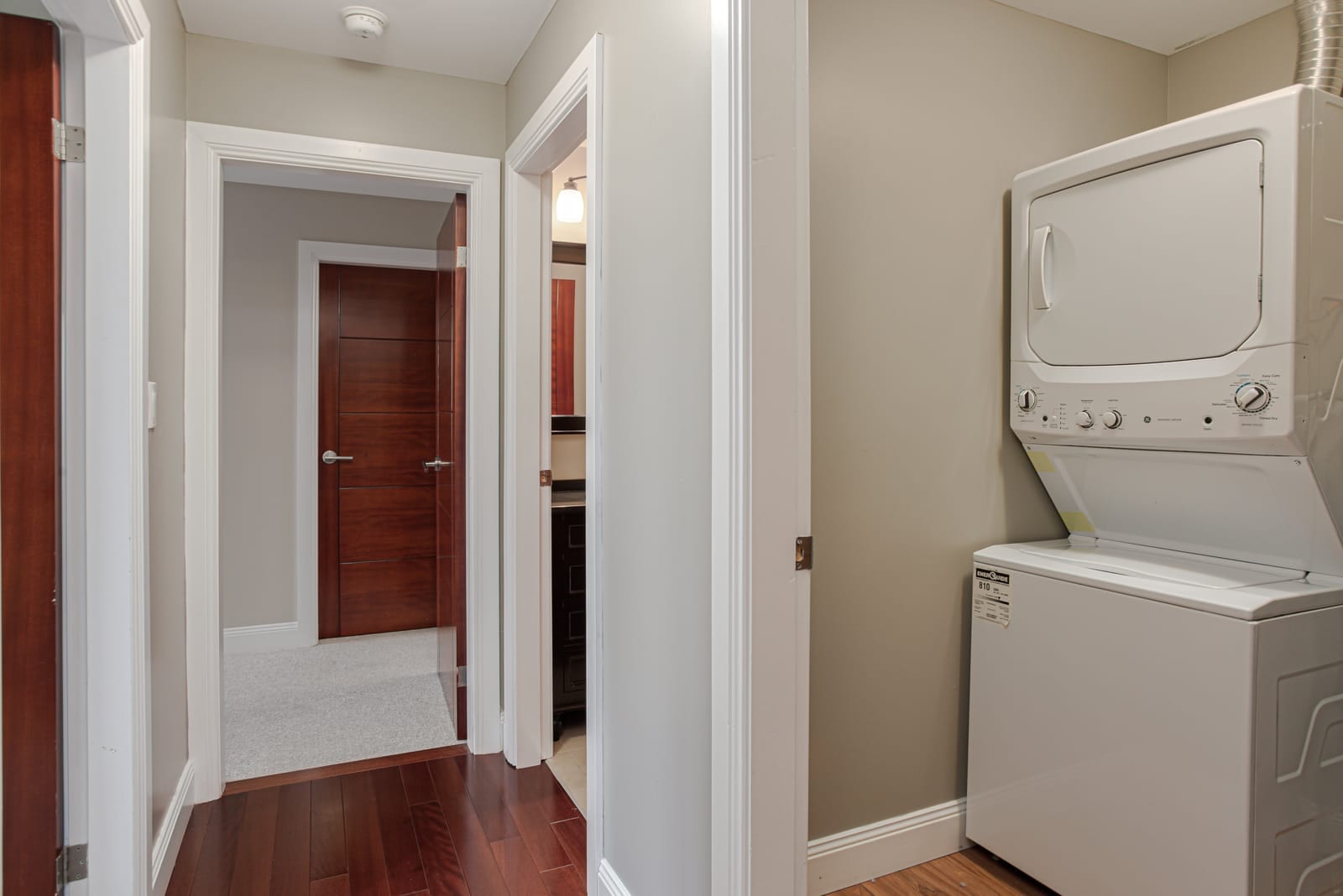 In-suite stacked washer and dryer